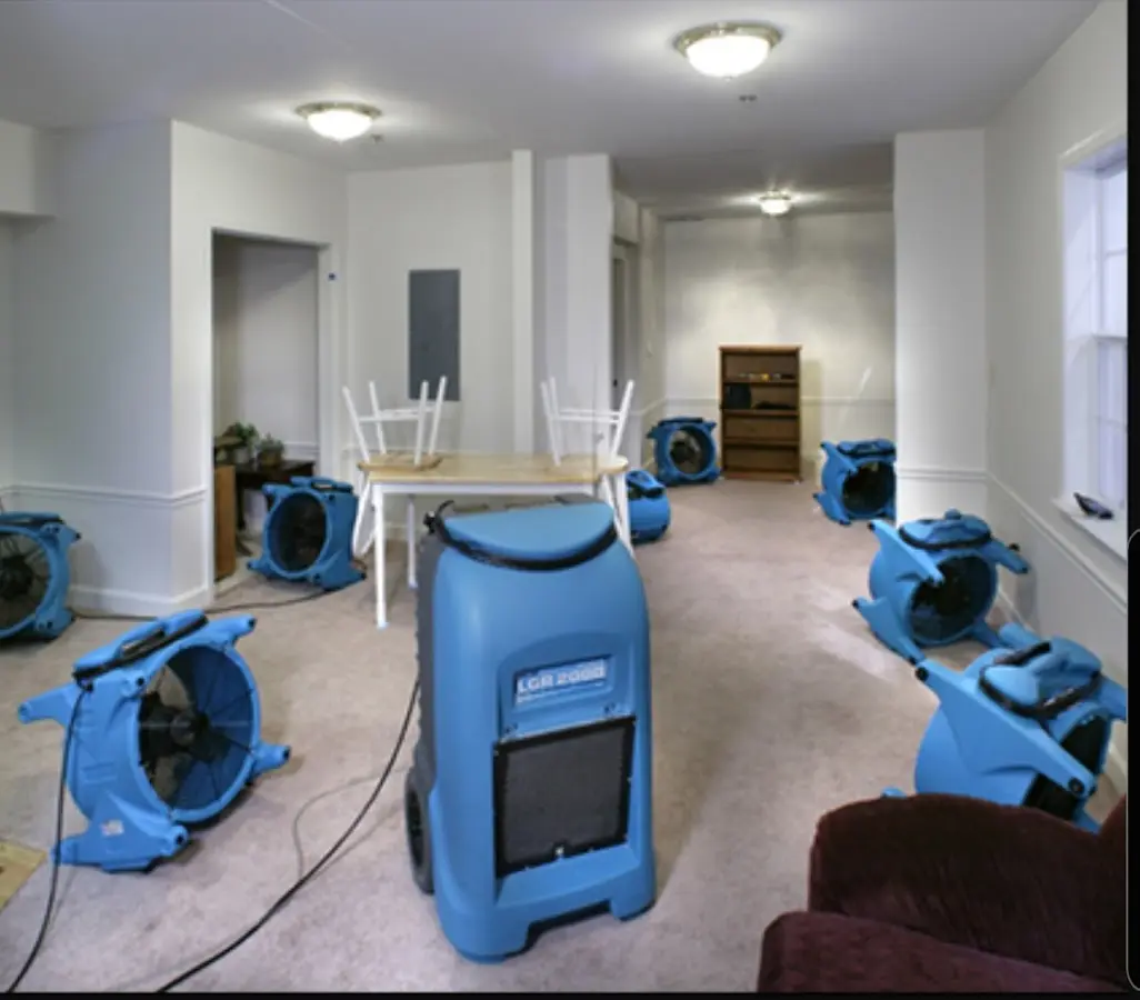 Air movers and dehumidifier setup for Water Damage Restoration in Midland
